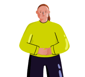 A digital character drawing of a white woman wearing a green jumper and navy trousers. The image is cropped to show the top of the trousers and upwards, and she is holding her hands to her stomach in pain. She has a pained look on her face.