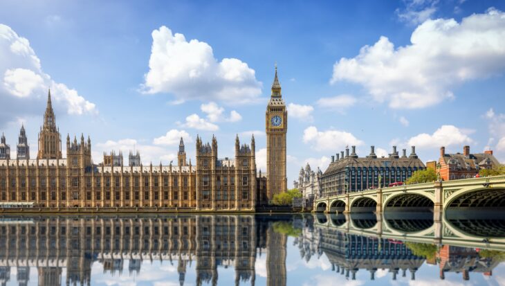 A photograph of the Houses of Parliament in London.
