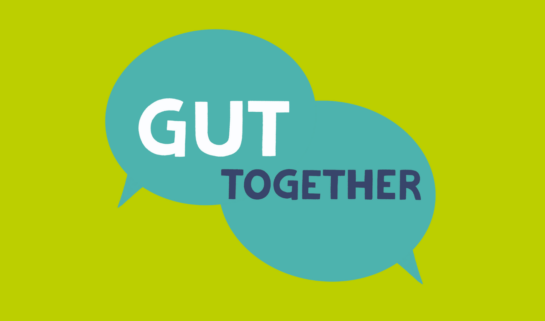 Two speech bubbles with the words Gut Together inside. The background is green and the words are white and blue.