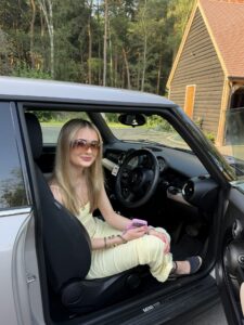 A young woman in a car