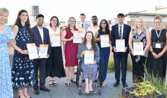 A group photo of all the winners in the Guts UK/Falk Foundation awards