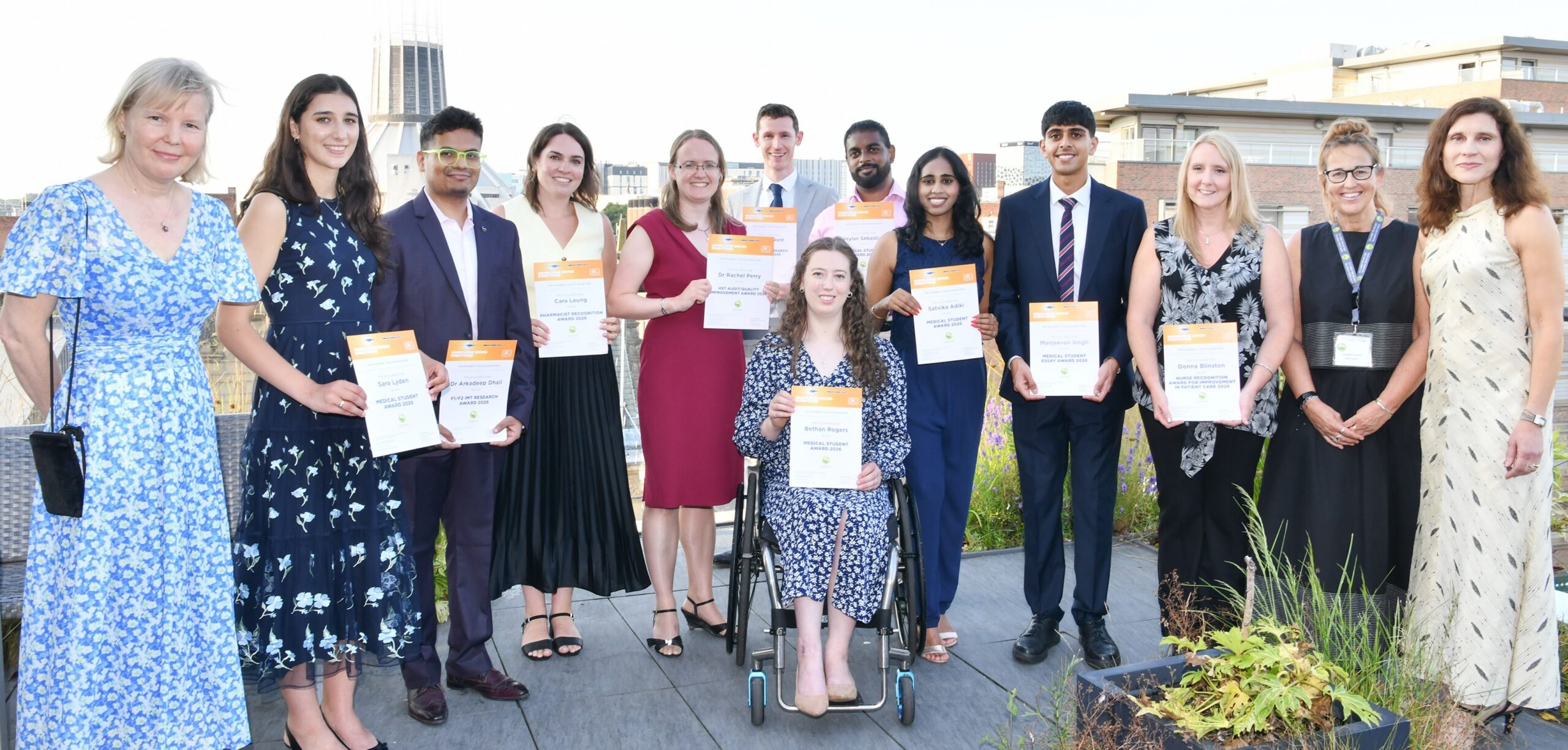 A group photo of all the winners in the Guts UK/Falk Foundation awards